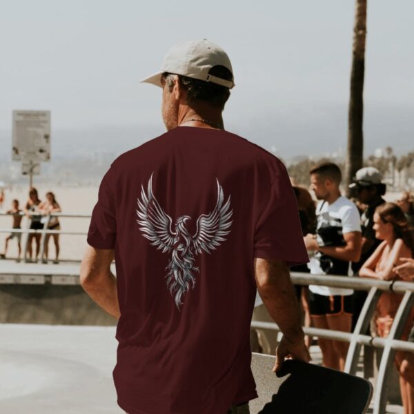 Phoenix design t-shirt by Attire Dot, showcasing a vibrant phoenix graphic on a high-quality 220gsm cotton oversized tee.