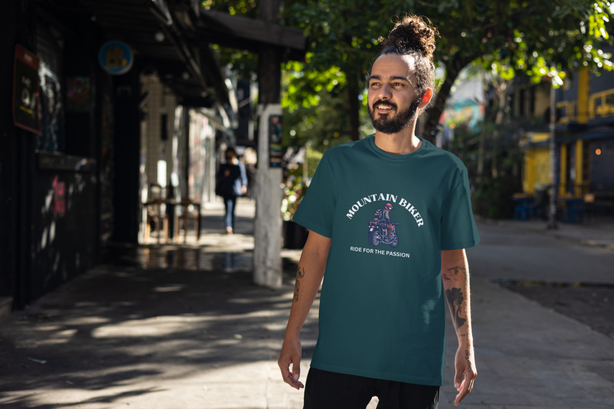 Oversized black t-shirt with the phrases "Mountain Biker" and "Ride for the Passion" printed, featuring a dynamic bike photo.